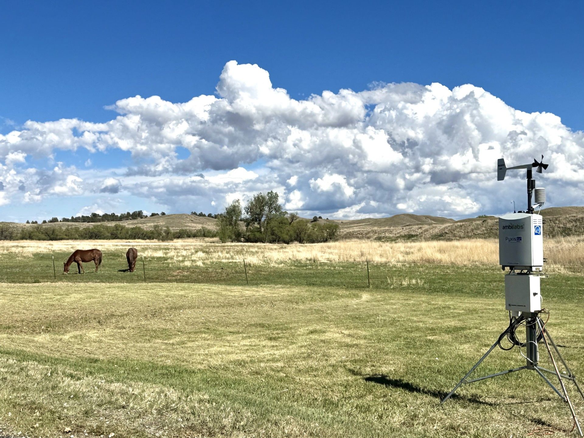 Ambilabs PyxisGC air monitoring station deployed in a rural field